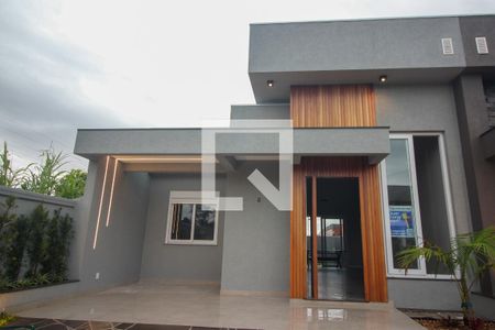 Fachada de casa de condomínio à venda com 3 quartos, 96m² em Cavalhada, Porto Alegre