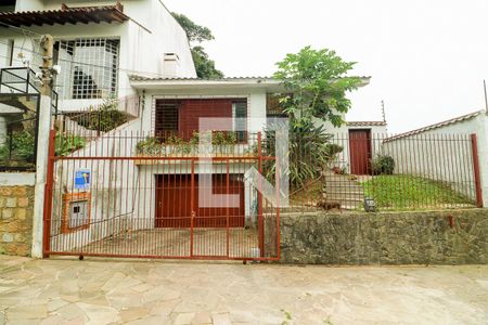 Fachada de casa à venda com 3 quartos, 226m² em Jardim Sabará, Porto Alegre