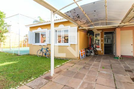 Fachada de casa de condomínio à venda com 3 quartos, 117m² em Rio Branco, Canoas