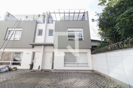Fachada de casa de condomínio à venda com 3 quartos, 197m² em Glória, Porto Alegre