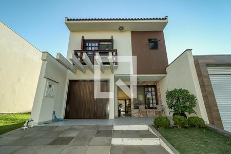 Fachada de casa de condomínio à venda com 3 quartos, 191m² em Passo das Pedras, Porto Alegre
