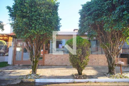 Fachada e Placa  de casa à venda com 3 quartos, 149m² em Rondônia, Novo Hamburgo