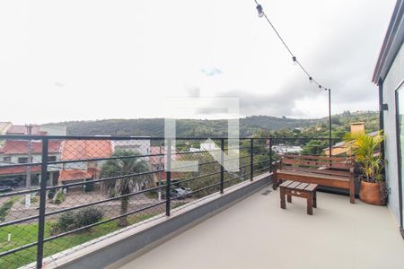Varanda de casa de condomínio à venda com 3 quartos, 300m² em Vila Nova, Porto Alegre