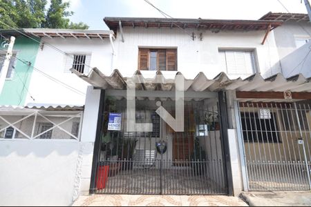 Fachada e placa de casa à venda com 3 quartos, 74m² em Vila Constança, São Paulo