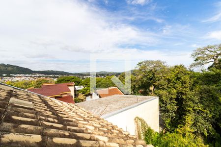 Vista de casa de condomínio à venda com 3 quartos, 175m² em Espírito Santo, Porto Alegre