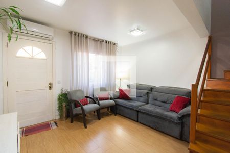 Sala de casa de condomínio para alugar com 3 quartos, 100m² em Marechal Rondon, Canoas
