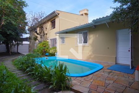 Quintal - Piscina de casa à venda com 4 quartos, 252m² em Navegantes, Porto Alegre