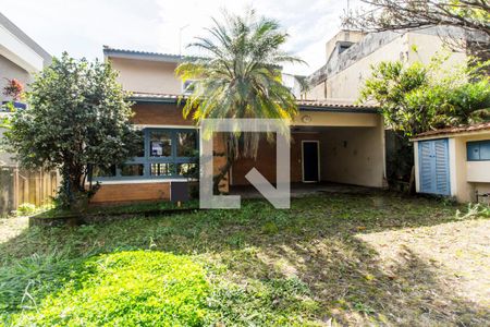 Casa de condomínio à venda com 340m², 3 quartos e 2 vagas Casa de condomínio à venda com 340m², 3 quartos e 2 vagasFachada