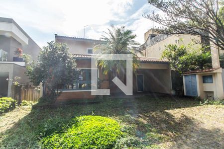 Casa de condomínio à venda com 340m², 3 quartos e 2 vagas Casa de condomínio à venda com 340m², 3 quartos e 2 vagasFachada