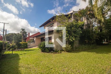Fachada de casa à venda com 5 quartos, 350m² em Ipanema, Porto Alegre