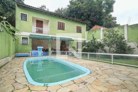 Área comum de casa à venda com 4 quartos, 238m² em Jardim Itu, Porto Alegre