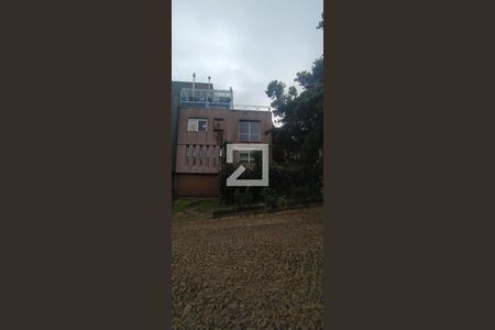 Fachada de casa à venda com 2 quartos, 250m² em Sétimo Céu, Porto Alegre