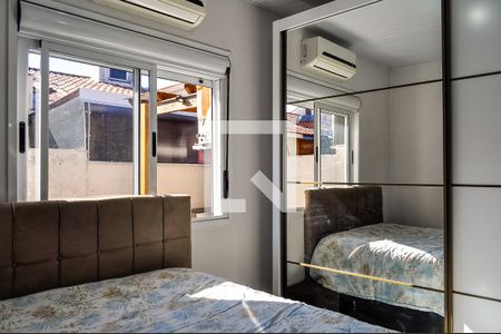 Suíte  de casa de condomínio à venda com 2 quartos, 49m² em Campo Novo, Porto Alegre