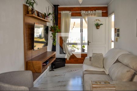 Sala de casa de condomínio à venda com 2 quartos, 49m² em Campo Novo, Porto Alegre