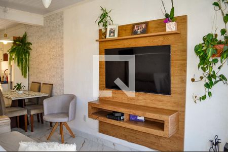 Sala de casa de condomínio à venda com 2 quartos, 49m² em Campo Novo, Porto Alegre