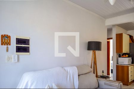 Sala de casa de condomínio à venda com 2 quartos, 49m² em Campo Novo, Porto Alegre