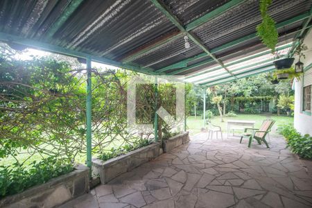 Garagem de casa à venda com 6 quartos, 408m² em Cristal, Porto Alegre