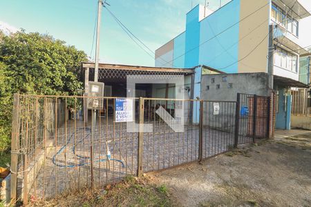Fachada e placa de casa à venda com 4 quartos, 65m² em Rubem Berta, Porto Alegre