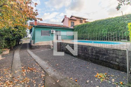Quintal de casa à venda com 3 quartos, 229m² em Vila Nova, Porto Alegre