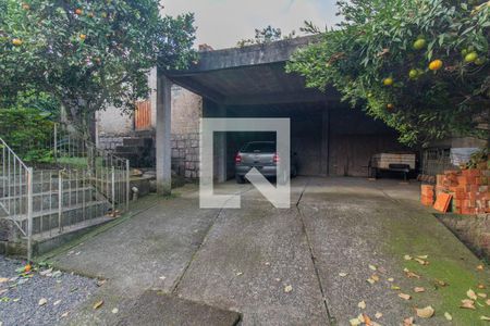 Garagem de casa à venda com 3 quartos, 229m² em Vila Nova, Porto Alegre