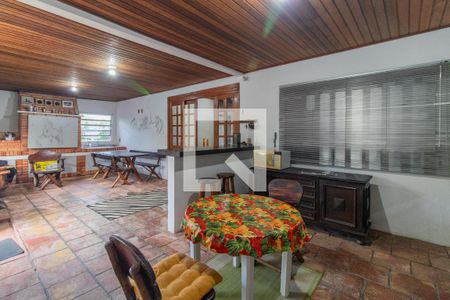 Cozinha e Área de Serviço de casa à venda com 3 quartos, 229m² em Vila Nova, Porto Alegre