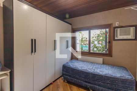 Quarto 2 de casa à venda com 3 quartos, 229m² em Vila Nova, Porto Alegre