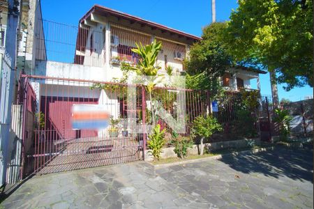 Fachada de casa à venda com 4 quartos, 265m² em Passo das Pedras, Porto Alegre