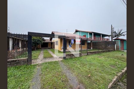 Fachada + Plaquinha de casa à venda com 3 quartos, 125m² em Santos Dumont, São Leopoldo