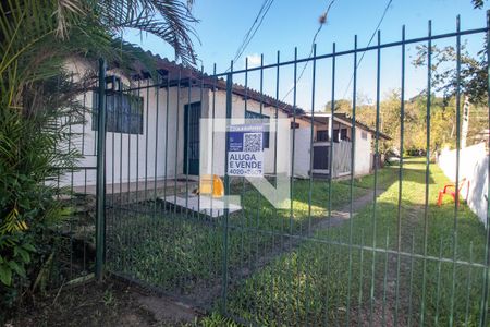 Fachada de casa à venda com 1 quarto, 60m² em Parque Urbano, Porto Alegre