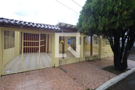 Fachada de casa à venda com 4 quartos, 156m² em Rio Branco, Canoas