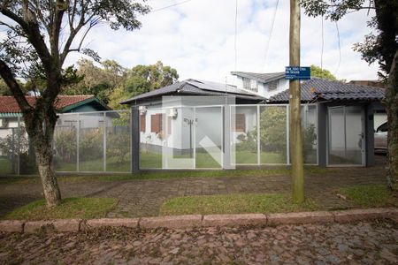 Fachada de casa à venda com 3 quartos, 250m² em Aberta dos Morros, Porto Alegre
