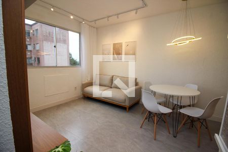 Sala de casa de condomínio à venda com 2 quartos, 40m² em Hípica, Porto Alegre