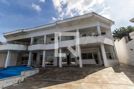 Fachada de casa de condomínio para alugar com 6 quartos, 1700m² em Alphaville, Santana de Parnaíba