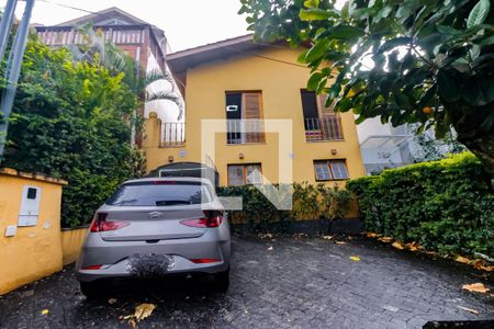 Fachada e garagem de casa de condomínio à venda com 3 quartos, 180m² em Jardim Ampliacao, São Paulo