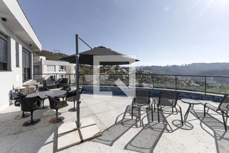 Sacada/Espaço Gourmet de casa de condomínio à venda com 4 quartos, 363m² em Jardim Serrano, Nova Lima