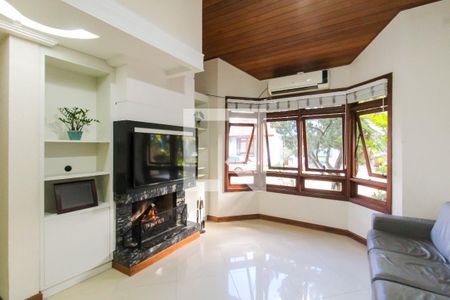 Sala de casa de condomínio à venda com 4 quartos, 243m² em Marechal Rondon, Canoas