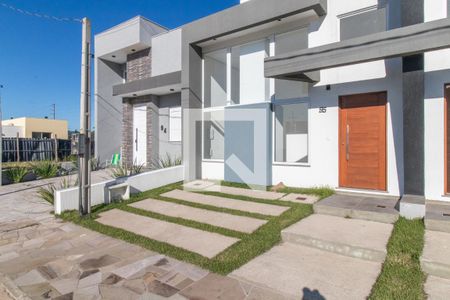 Fachada de casa de condomínio à venda com 3 quartos, 92m² em Hípica, Porto Alegre