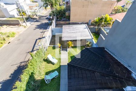 Quintal de casa à venda com 3 quartos, 138m² em Guarujá, Porto Alegre