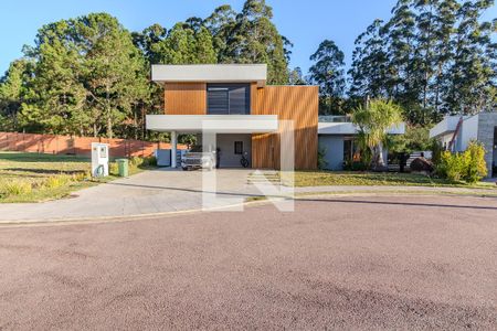Fachada de casa de condomínio à venda com 4 quartos, 344m² em Belém Velho, Porto Alegre