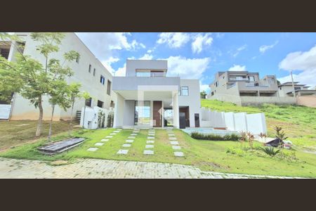 Fachada de casa de condomínio à venda com 4 quartos, 503m² em Alphaville Vespasiano, Vespasiano