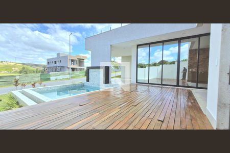 Piscina de casa de condomínio à venda com 4 quartos, 503m² em Alphaville Vespasiano, Vespasiano