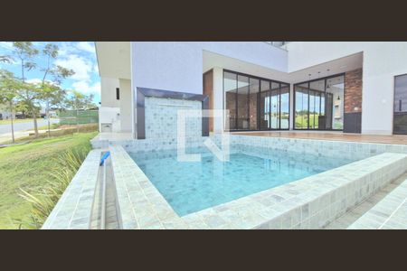 Piscina de casa de condomínio à venda com 4 quartos, 503m² em Alphaville Vespasiano, Vespasiano