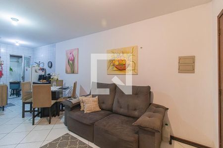 Sala de casa de condomínio à venda com 2 quartos, 56m² em Vila Nova, Porto Alegre