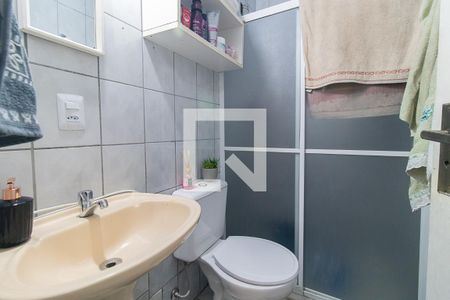 Banheiro de casa de condomínio à venda com 2 quartos, 56m² em Vila Nova, Porto Alegre