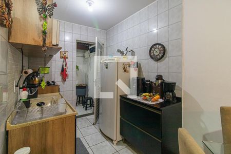 Cozinha e Área de Serviço de casa de condomínio à venda com 2 quartos, 56m² em Vila Nova, Porto Alegre