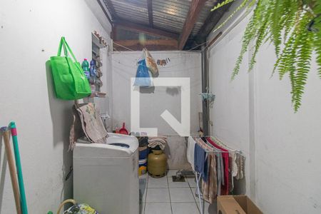 Cozinha e Área de Serviço de casa de condomínio à venda com 2 quartos, 56m² em Vila Nova, Porto Alegre