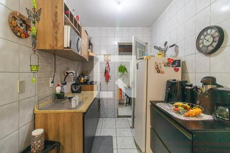 Cozinha e Área de Serviço de casa de condomínio à venda com 2 quartos, 56m² em Vila Nova, Porto Alegre