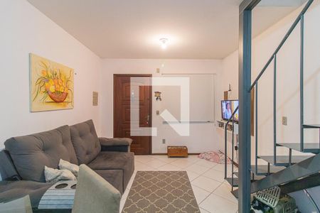 Sala de casa de condomínio à venda com 2 quartos, 56m² em Vila Nova, Porto Alegre
