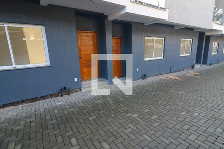 Garagem de casa de condomínio à venda com 2 quartos, 70m² em Nonoai, Porto Alegre