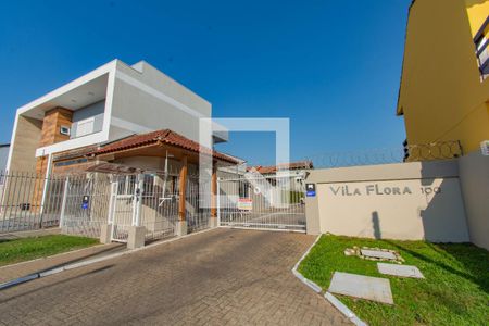 Fachada de casa de condomínio à venda com 3 quartos, 120m² em Fátima, Canoas